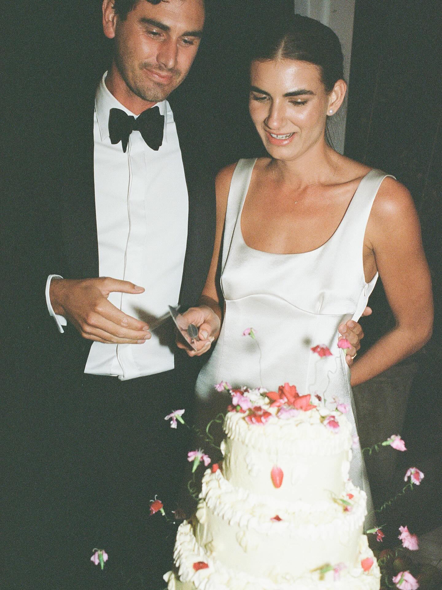 Worthy of the cake-cutting moment ? The original Dress That All The Bad Boys Like is back ? Limited Pre-Orders now open at maggiemarilyn.com, shipping August 29. 
 As seen here on dream bride Natasha with her husband Will, captured by @kerynsweeneyphotographer